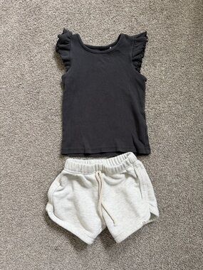 CottonOn Black Ruffled Sleeve Tee + Little Road Co Light Gray Shorts Outfit